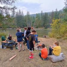students near the lake students near the lake
